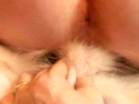 Woman bounces on dog knot while boyfriend holds it
